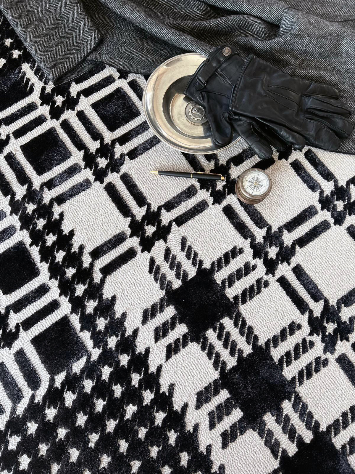 Plaid Chanel rug by Volver Studios black white