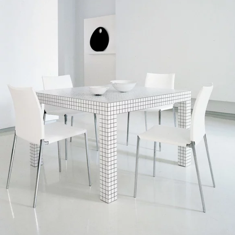 Lia Chairs in white and quaderna tableZanotta